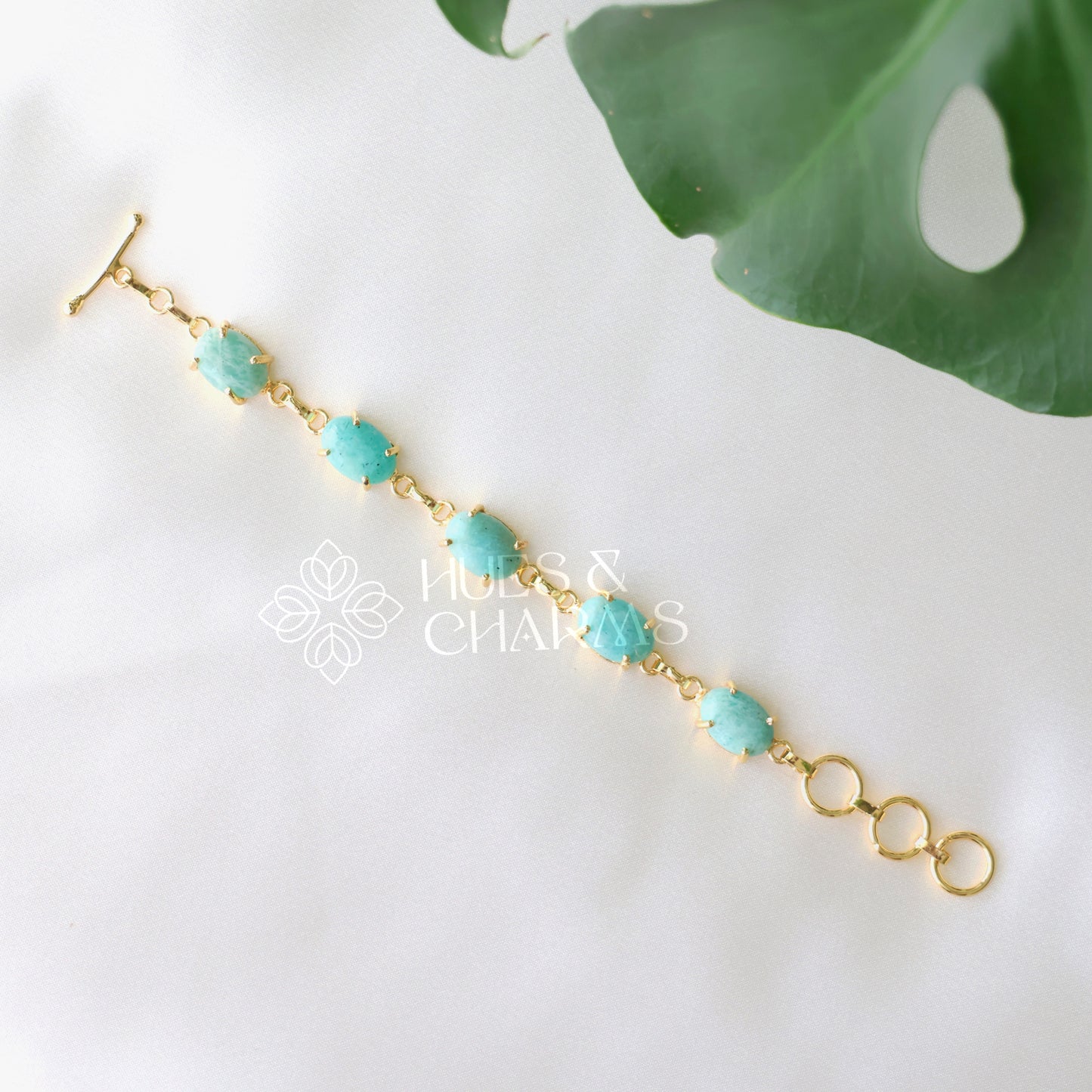 GOLDEN OVAL SHAPE STONE ADJUSTABLE BRACELET (COLOURS AVAILABLE)