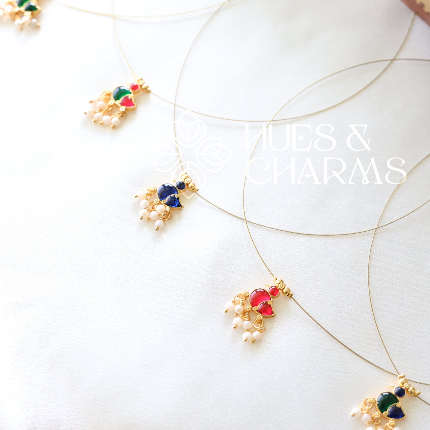 GOLDEN DUCK CHARM FLOATING NECKPIECE (COLOURS AVAILABLE)