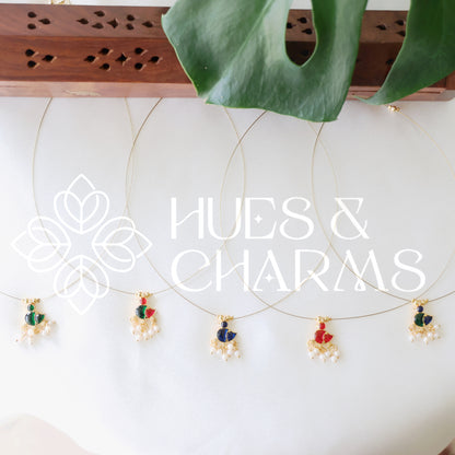 GOLDEN DUCK CHARM FLOATING NECKPIECE (COLOURS AVAILABLE)