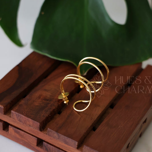 GOLDEN SWIRL HOOP EARRINGS