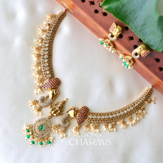 GOLDEN HERITAGE LAKSMI DETAILED STATEMENT NECKLACE SET WITH PEARLS