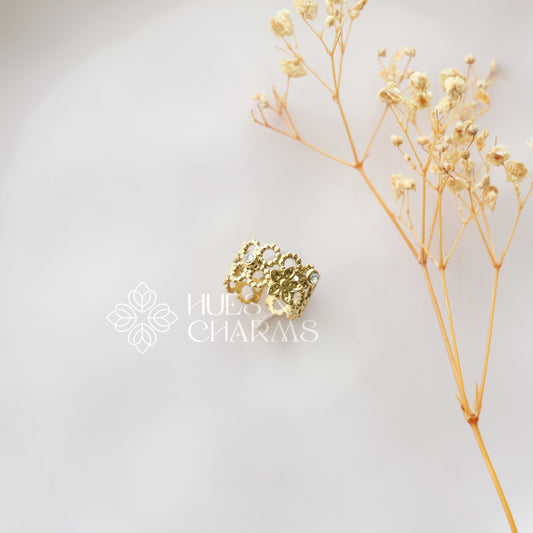 GOLDEN FLORA STATEMENT ADJUSTABLE RING