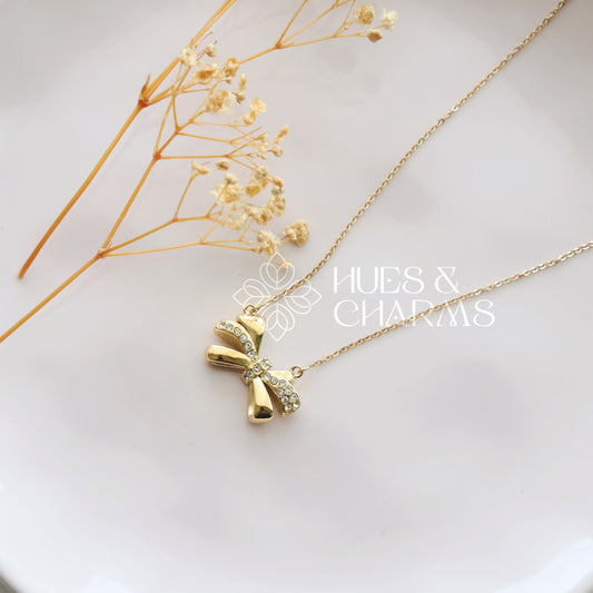 GOLDEN AD BOW PENDANT NECKPIECE