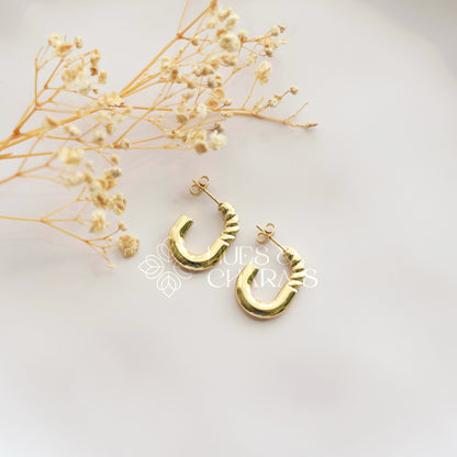 GOLDEN HALF TWISTED OVAL HOOPS