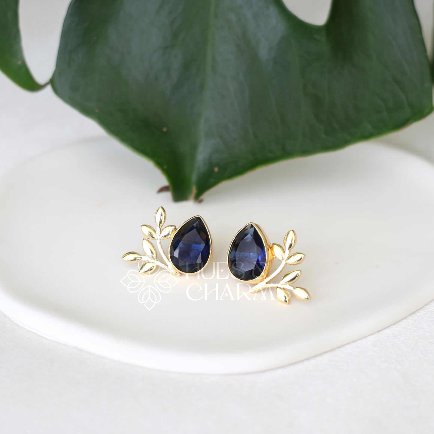GOLDEN GLOSSY FLORA STUDS