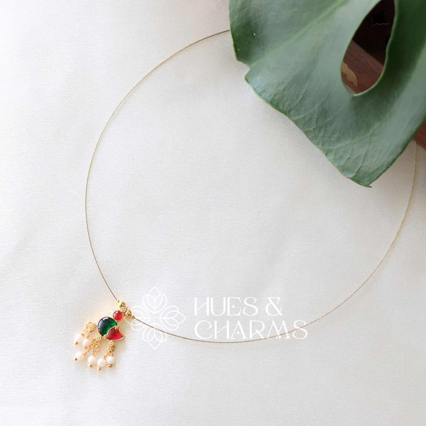 GOLDEN DUCK CHARM FLOATING NECKPIECE (COLOURS AVAILABLE)