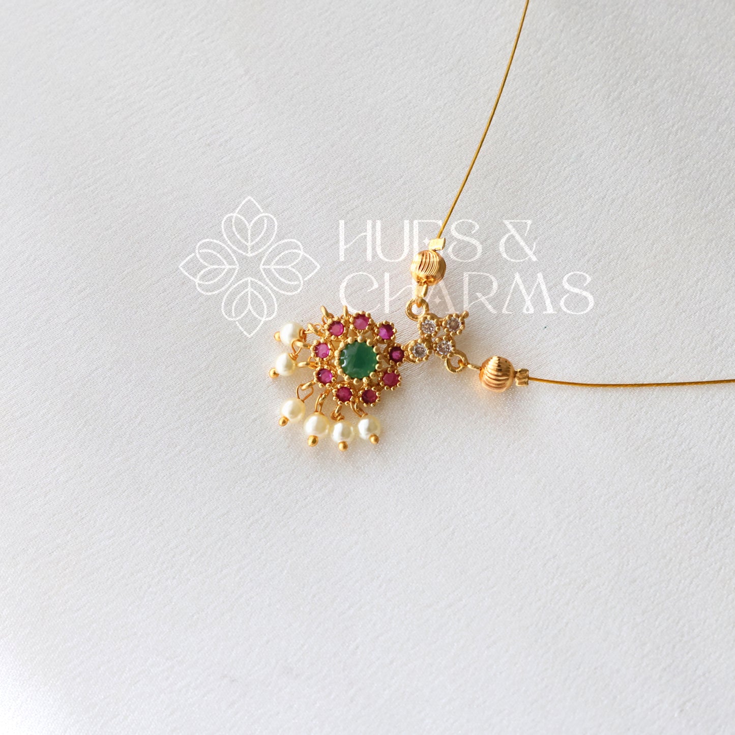 TRADITIONAL FLORAL CHARM FLOATING NECKLACE SET