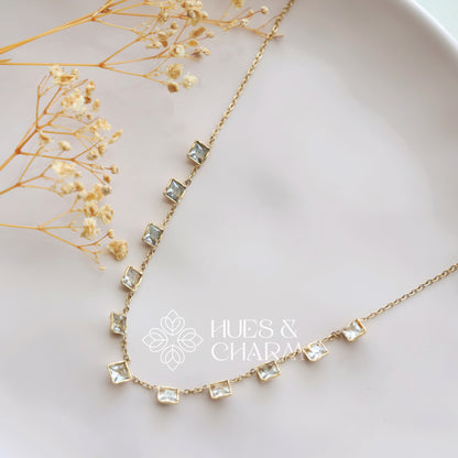 GOLDEN AD SQUARE CHARMS NECKPIECE
