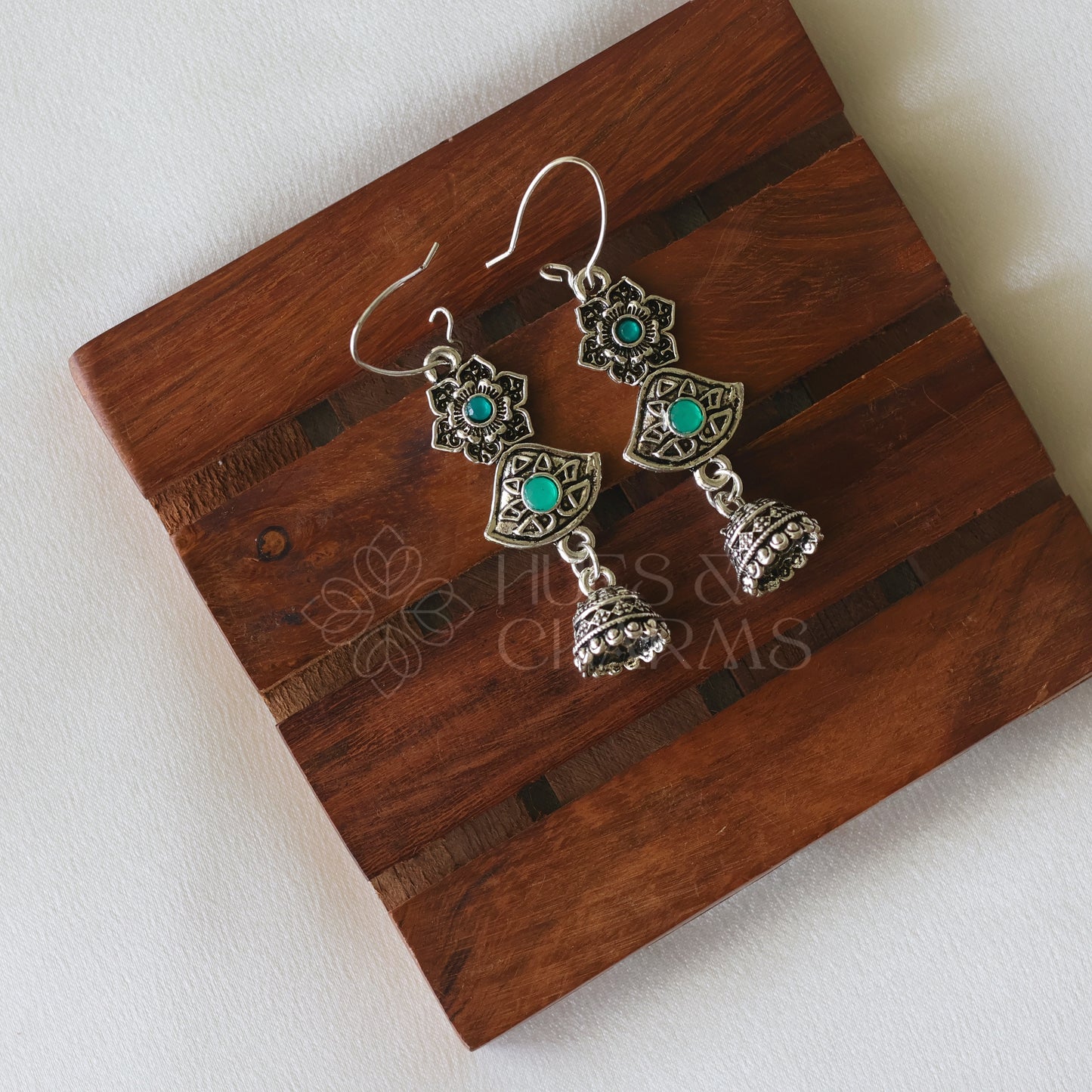 OXIDIZED FLOWER JUMKA EARRINGS- GREEN